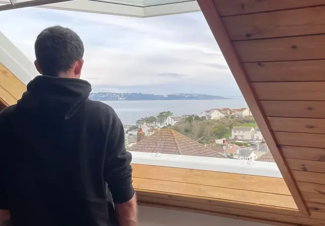 Looking out over the bay through a newly fitted VELUX balcony window